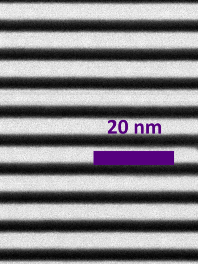 Transmission electron microscope cross-section of a REX-Optics multilayer showing perfectly periodic smooth layers, 20 nanometre scale bar